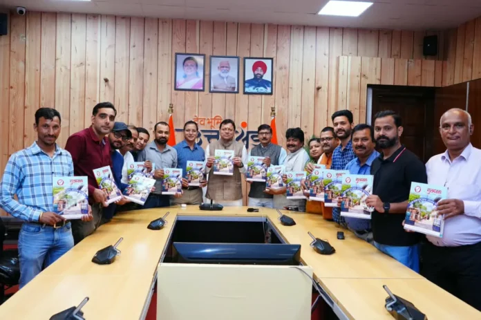 cm dhami in press club smarika vimochan