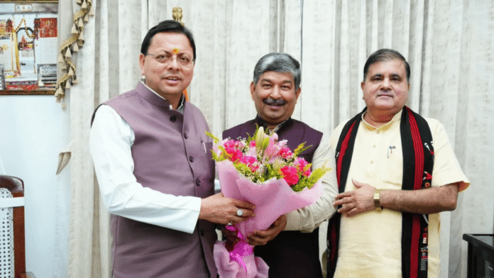 cm dhami with dinesh arya (1) cm dhami with dinesh arya (1)